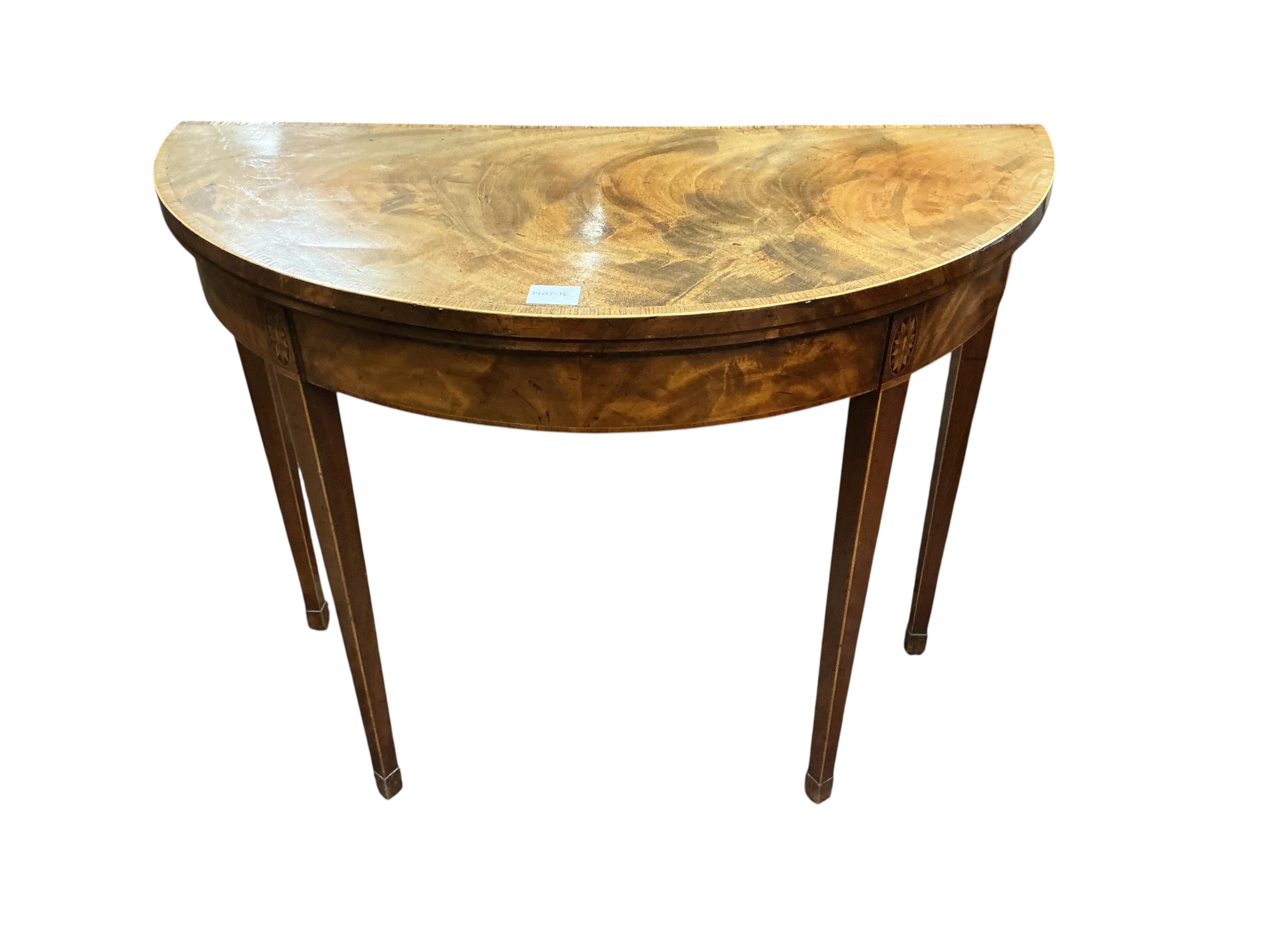 A George III inlaid banded mahogany 'D' shaped folding card table, width 94cm, depth 44cm, height 73cm
